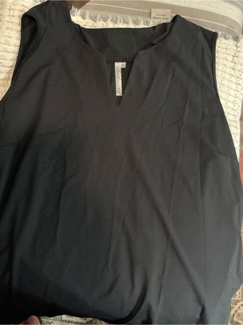 Lulu - B  Solid UPF50 + Split Neck Sleeveless
Top in Black